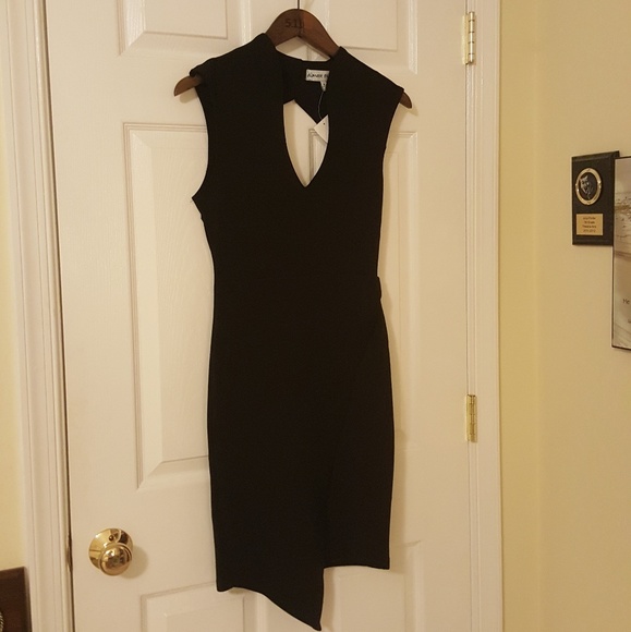 Almost Famous Dresses & Skirts - NWOT Black dress with plunge & asymmetric skirt